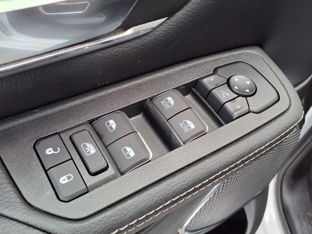 2026 RAM 1500 Laramie Bright White Clearcoat at League City CDJR