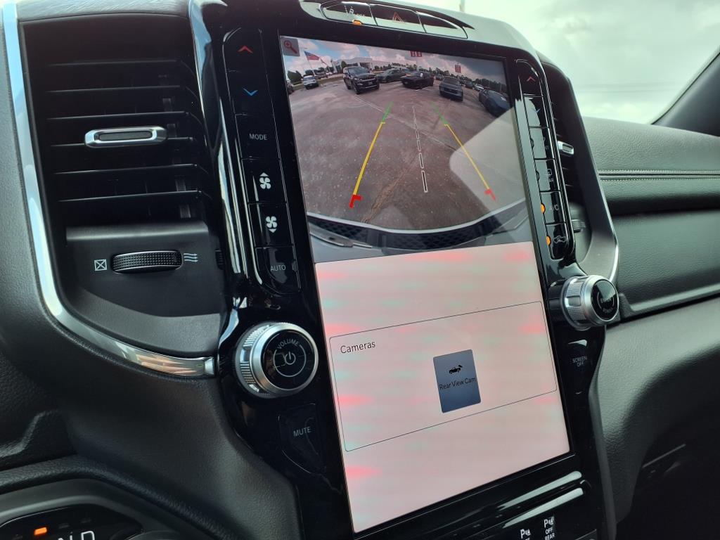 2026 RAM 1500 Laramie Bright White Clearcoat at League City CDJR