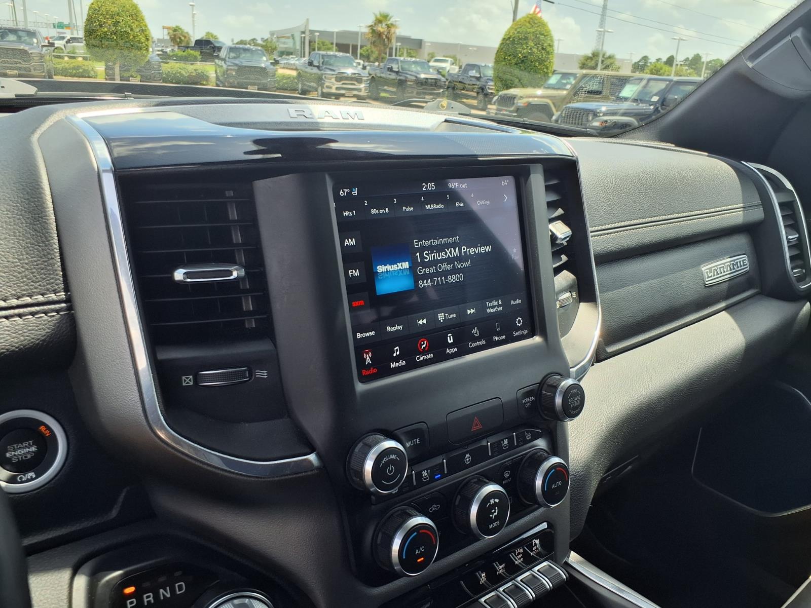 2020 RAM 1500 Laramie Flame Red Clearcoat at League City CDJR