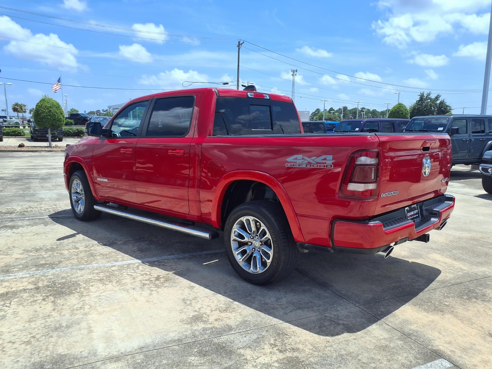 2020 RAM 1500 Laramie Flame Red Clearcoat at League City CDJR