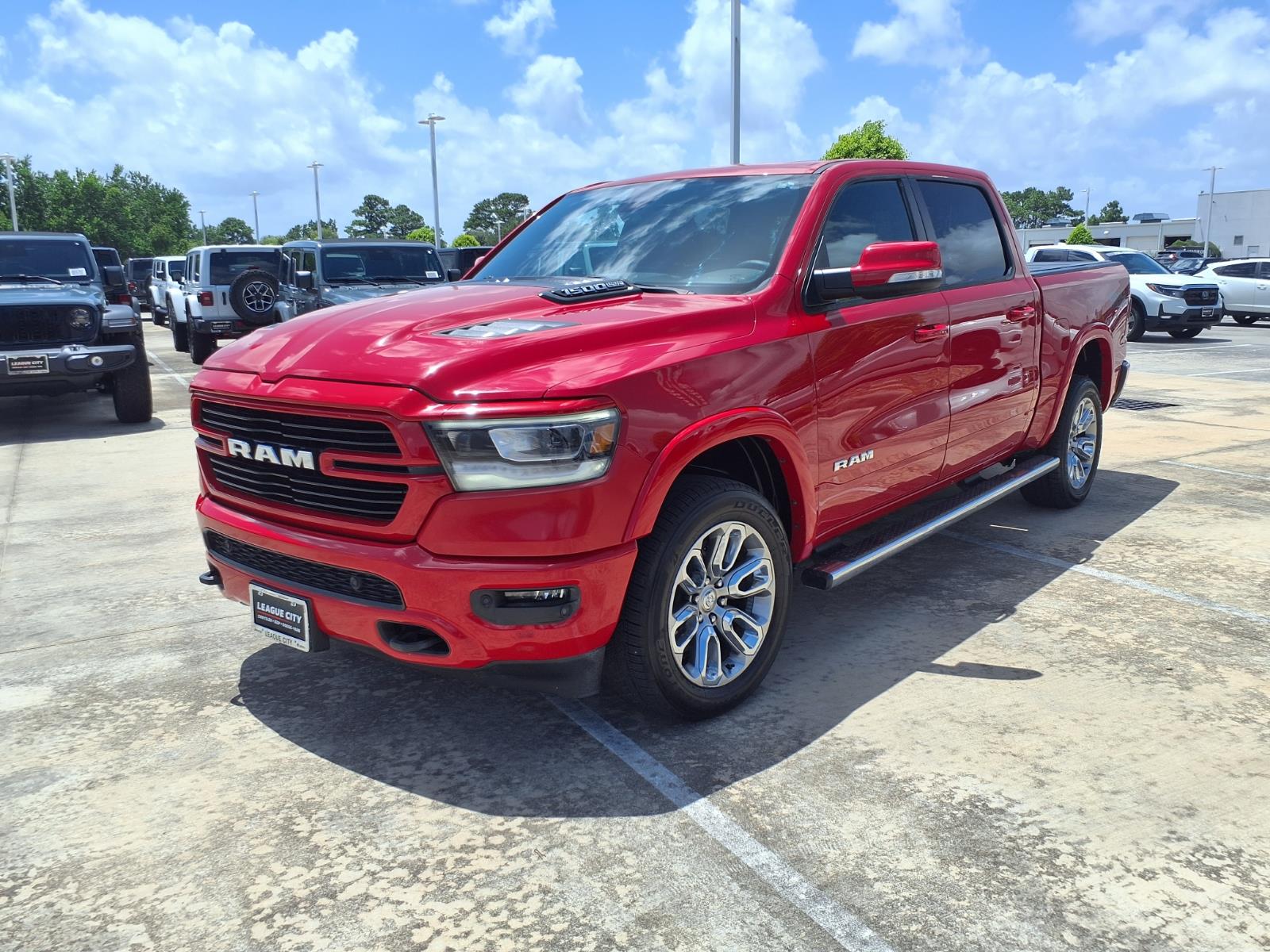 2020 RAM 1500 Laramie Flame Red Clearcoat at League City CDJR