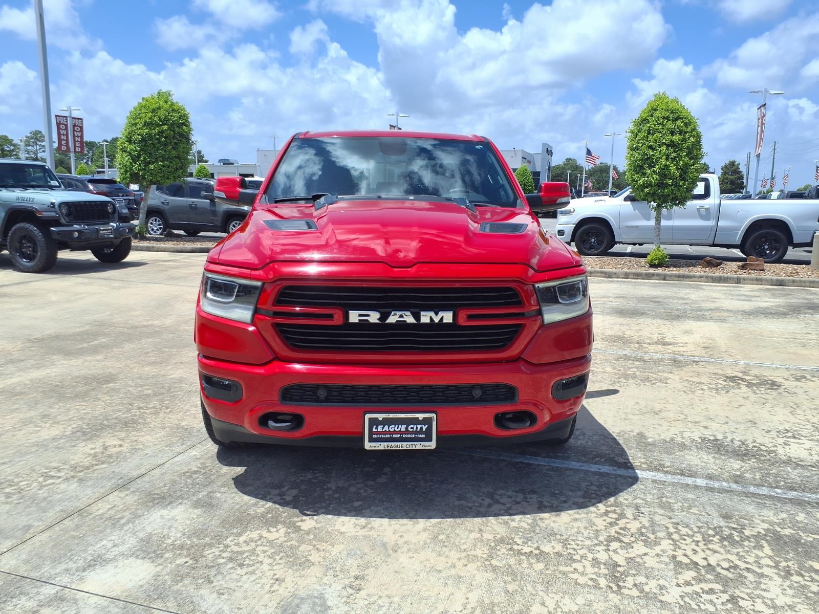2020 RAM 1500 Laramie Flame Red Clearcoat at League City CDJR