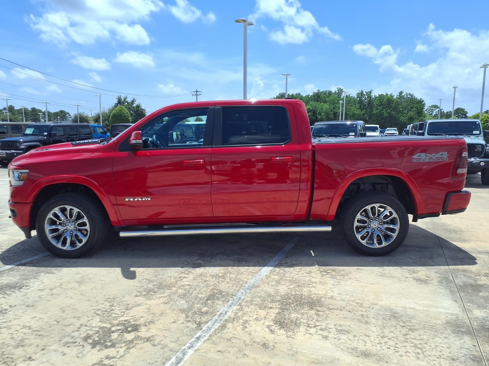 2020 RAM 1500 Laramie Flame Red Clearcoat at League City CDJR