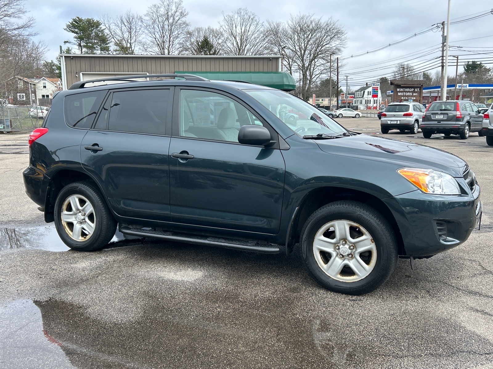 Black Forest Pearl (6t3) 2009 Toyota RAV4 Base 4WD SUV / Crossover Four-Wheel Drive 4-Speed Automatic