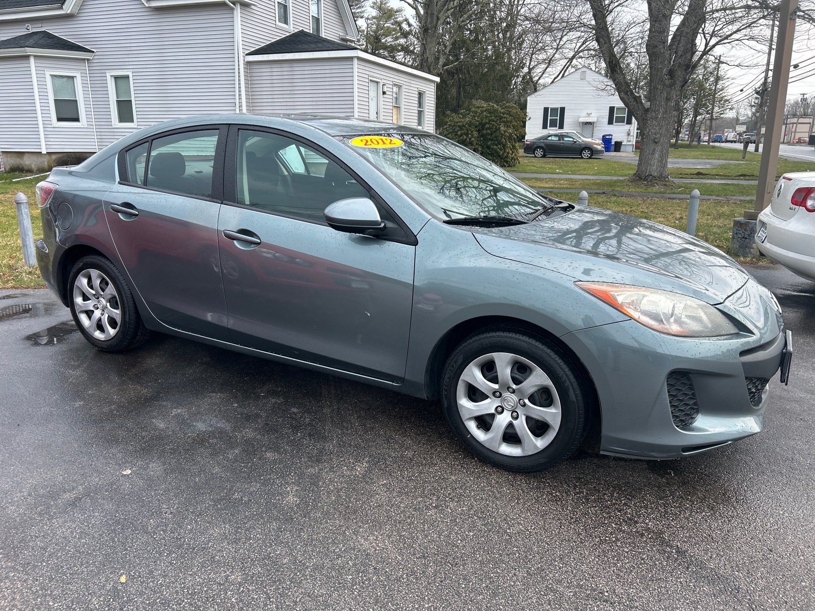 Liquid Silver Metallic (38p) 2012 Mazda MAZDA3 i Sport Sedan Front-Wheel Drive 5-Speed Automatic