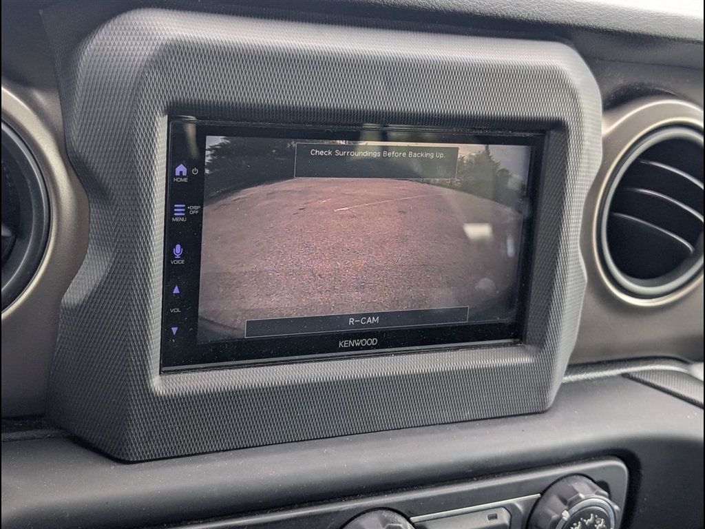 Used 2018 Billet Silver Metallic Clear Coat Jeep Sport S image 10