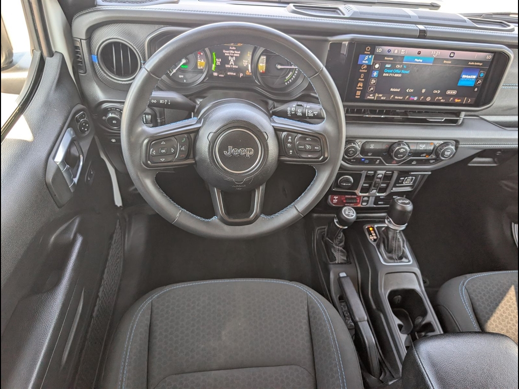 Used 2024 Bright White Clear Coat Jeep Rubicon 4xe image 18