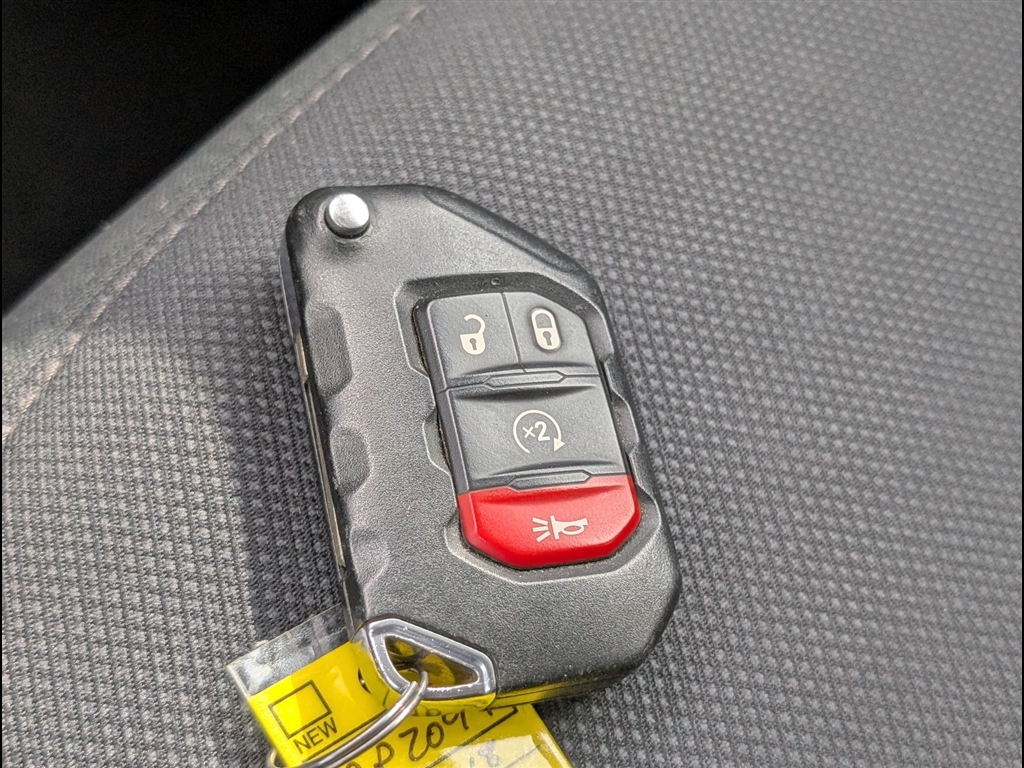 Used 2018 Billet Silver Metallic Clear Coat Jeep Sport S image 19