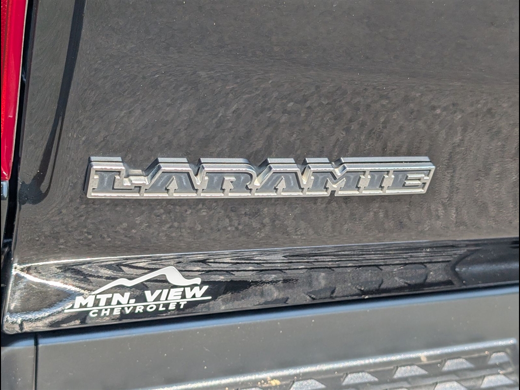 Used 2024 Diamond Black Crystal Pearl Coat RAM Laramie image 5