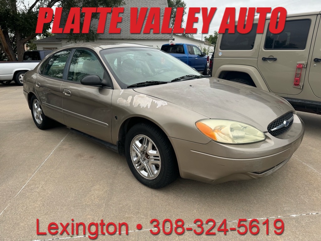 Gold 2002 Ford Taurus SES Sedan Front-Wheel Drive 4-Speed Automatic