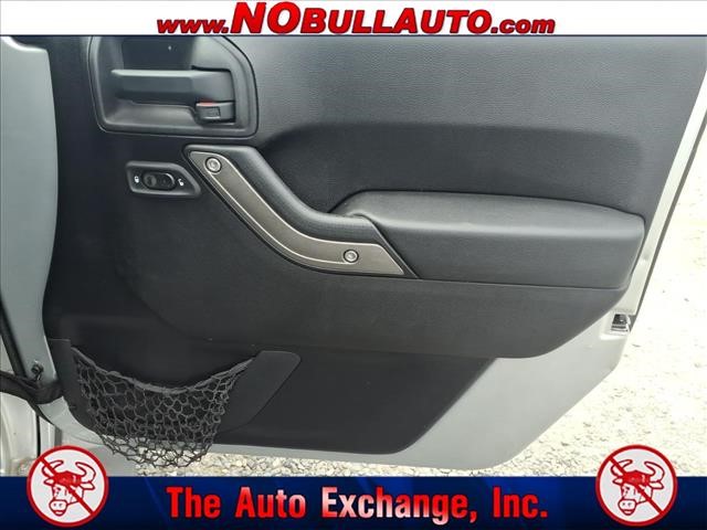 2011 Jeep Wrangler Unlimited Sport:RS25143