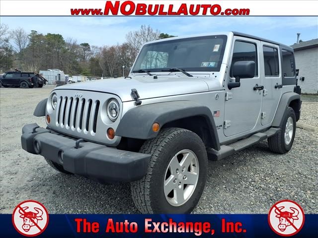 2011 Jeep Wrangler Unlimited Sport:RS25143