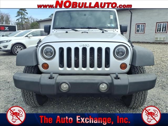 2011 Jeep Wrangler Unlimited Sport:RS25143