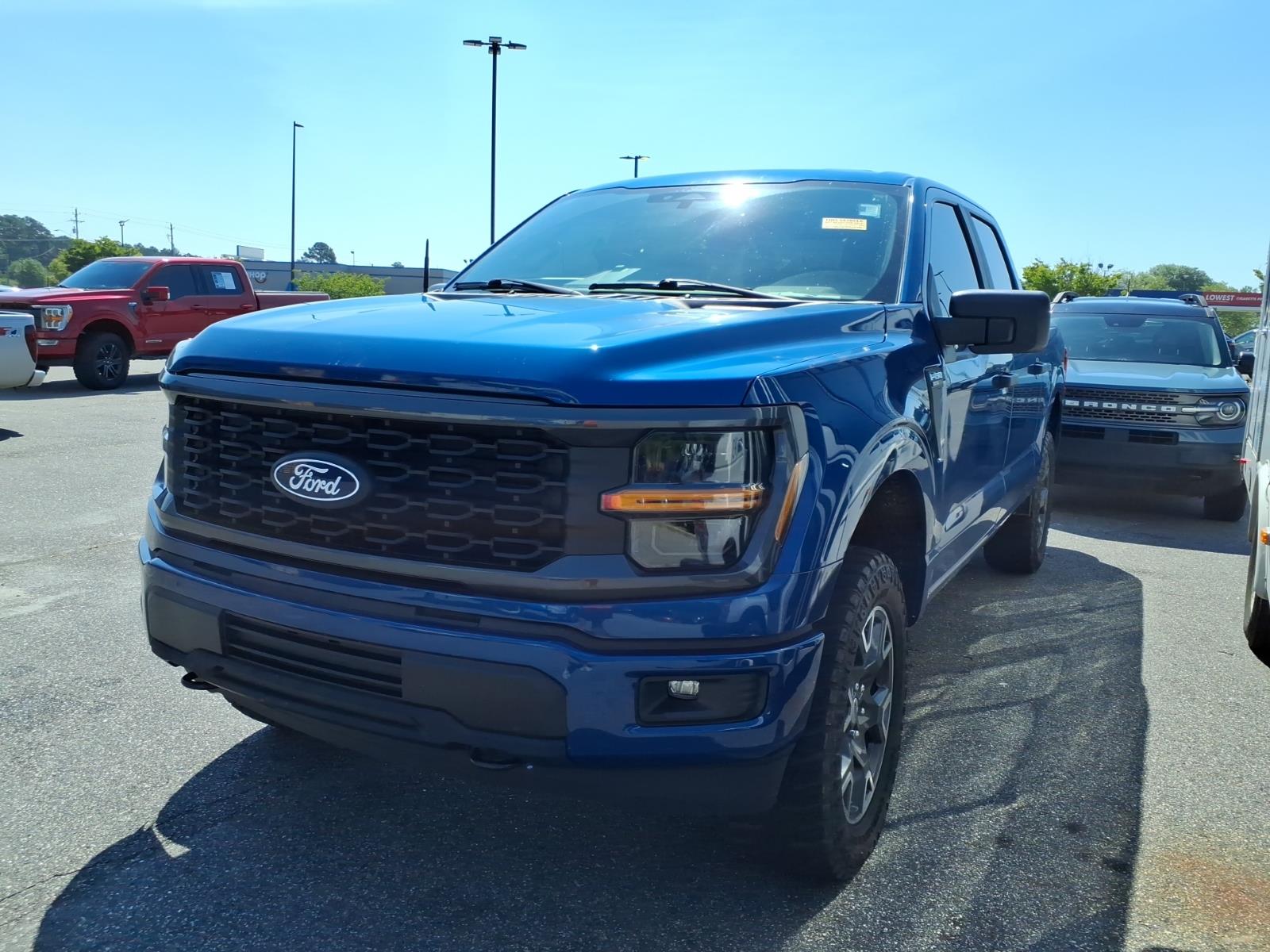 Blue 2024 Ford F-150 Pickup Truck Four-Wheel Drive Automatic