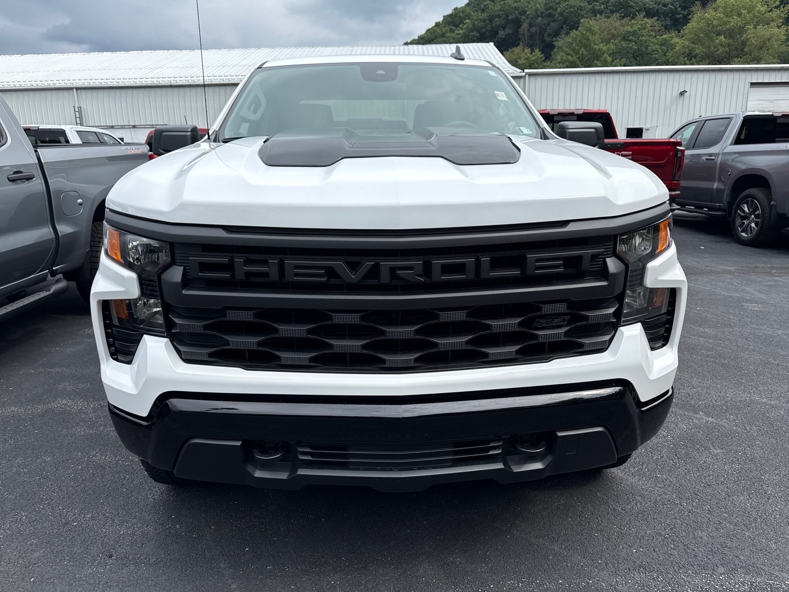 2026 Chevrolet Silverado 1500 Custom Trail Boss Summit White Gaz at Memorial Highway Chevrolet