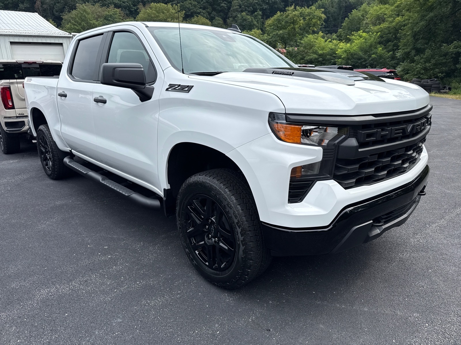 2026 Chevrolet Silverado 1500 Custom Trail Boss Summit White Gaz at Memorial Highway Chevrolet