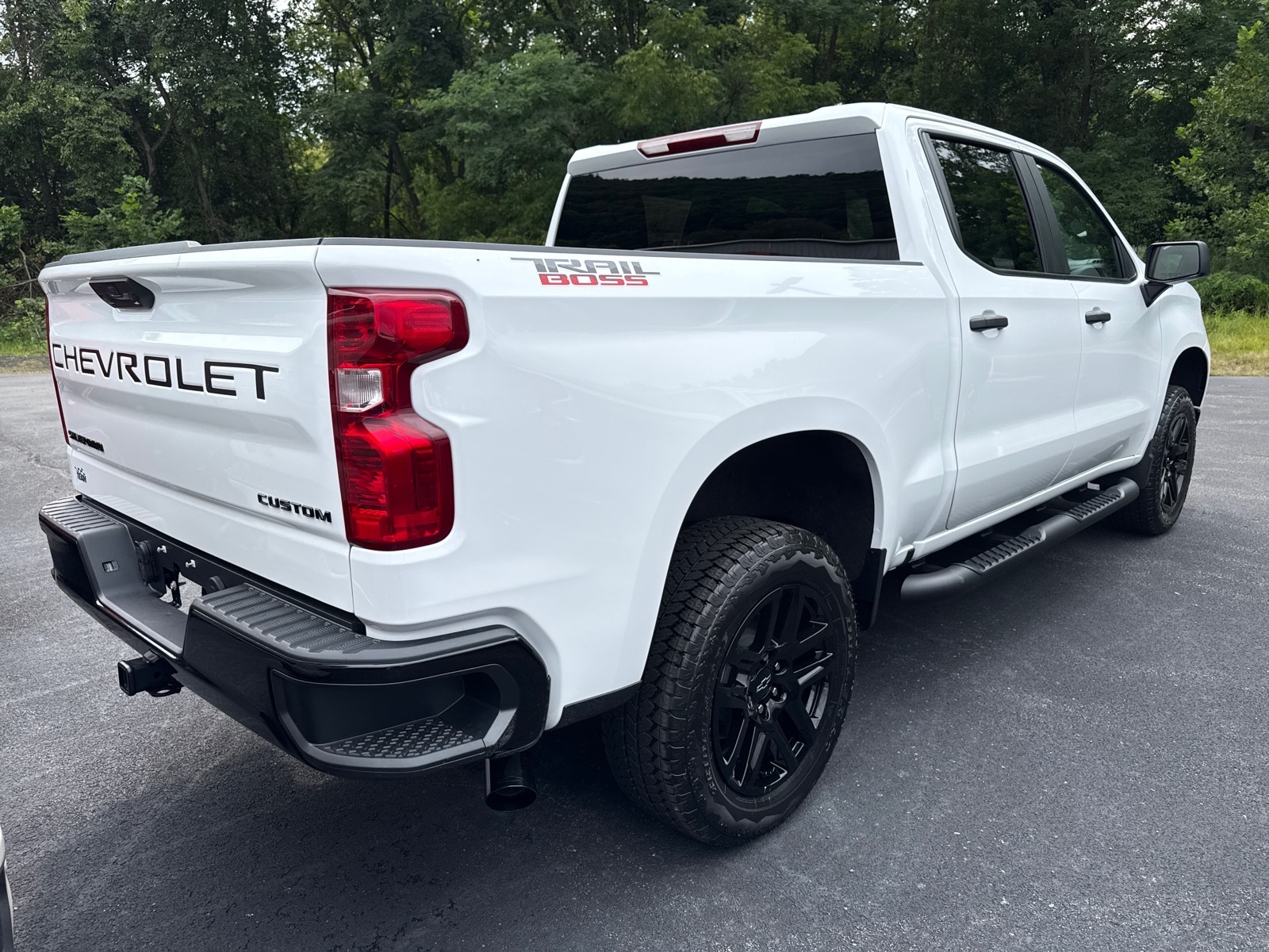 2026 Chevrolet Silverado 1500 Custom Trail Boss Summit White Gaz at Memorial Highway Chevrolet