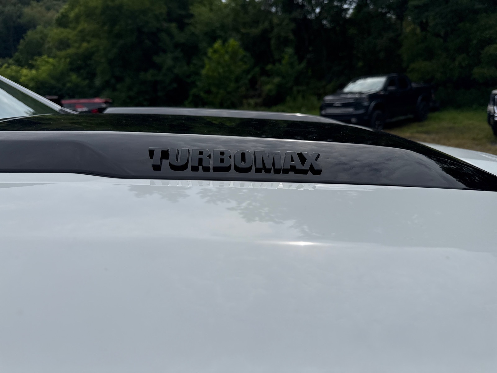 2026 Chevrolet Silverado 1500 Custom Trail Boss Summit White Gaz at Memorial Highway Chevrolet