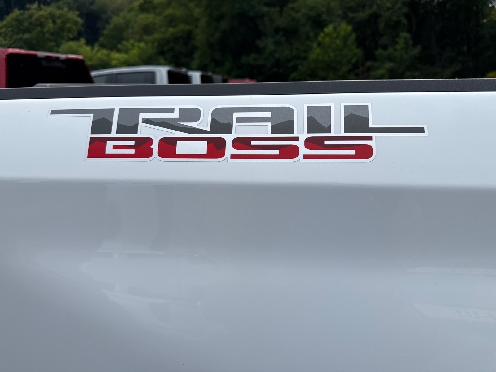 2026 Chevrolet Silverado 1500 Custom Trail Boss Summit White Gaz at Memorial Highway Chevrolet