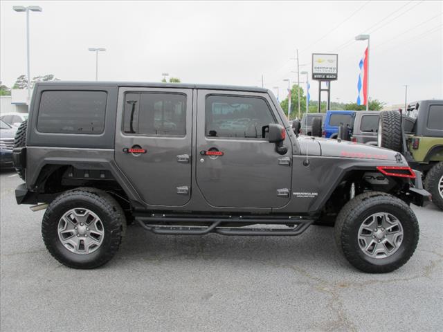 used 2016 Jeep Wrangler Unlimited car, priced at $26,465