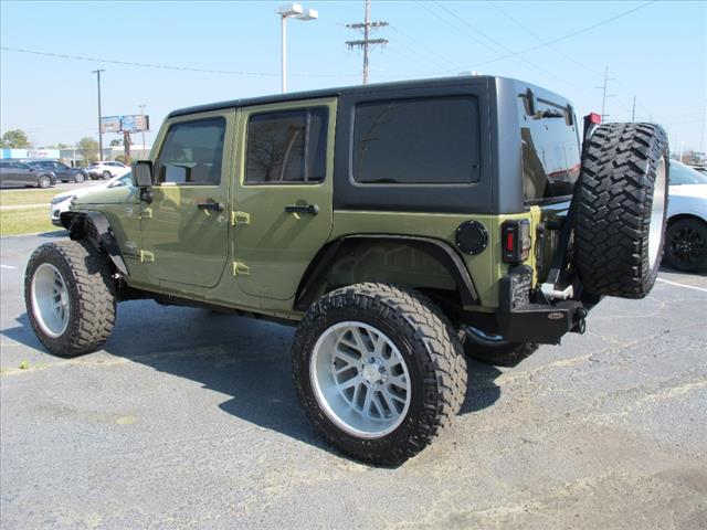 used 2013 Jeep Wrangler Unlimited car, priced at $18,700