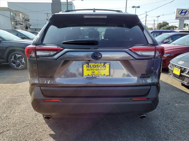 used 2021 Toyota RAV4 Hybrid car, priced at $28,588